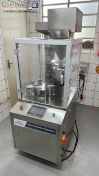CETRO automatic capsule encapsulator, 12,000 capsules per hour.