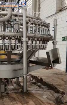 Rotary filling, rinsing, and capping machine for carbonated products 40 60 8 CFT